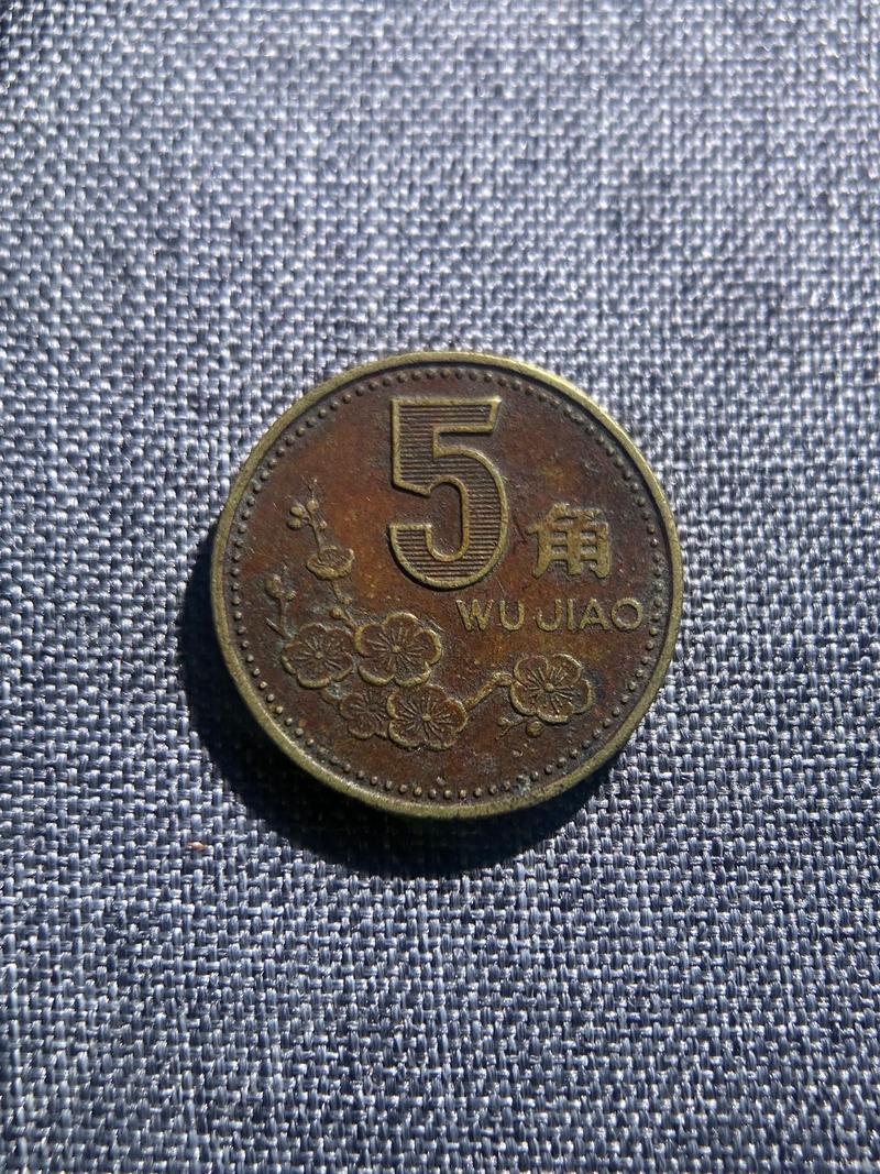 梅花2000五角硬币价格 一、先看规格:你手里的到底是哪一种